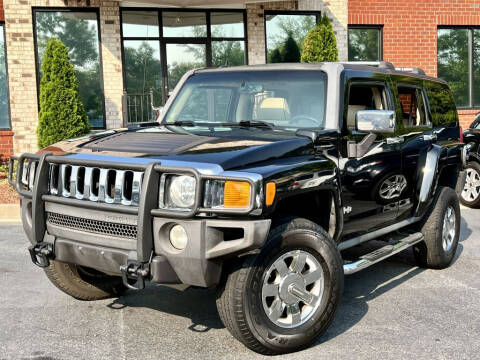 2006 HUMMER H3 for sale at Atlanta Unique Auto Sales in Norcross GA