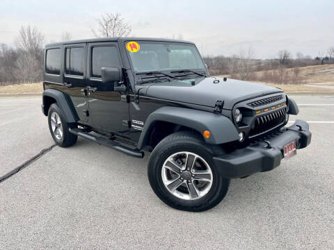 2014 Jeep Wrangler Unlimited for sale at A & S Auto and Truck Sales in Platte City MO