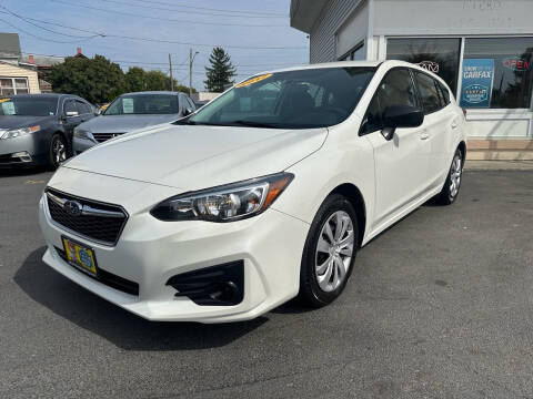 2017 Subaru Impreza for sale at ADAM AUTO AGENCY in Rensselaer NY