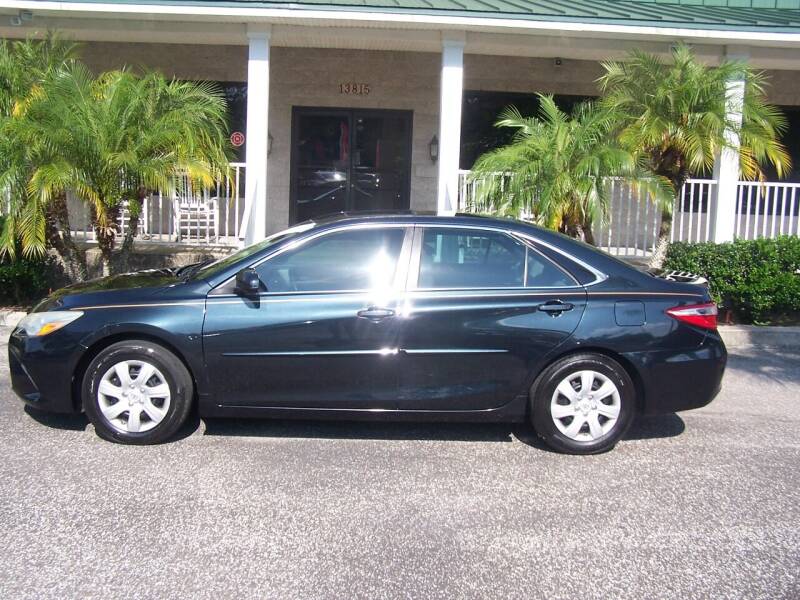 2015 Toyota Camry for sale at Thomas Auto Mart Inc in Dade City FL
