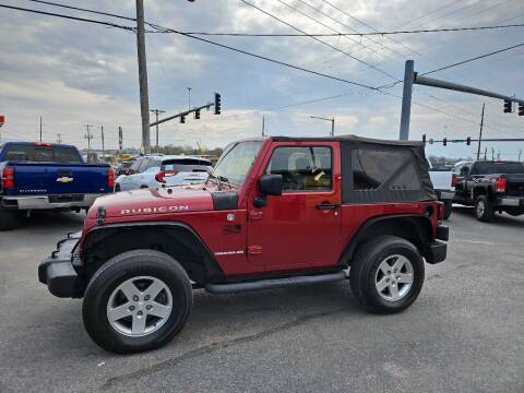 2012 Jeep Wrangler for sale at CarTime in Rogers AR