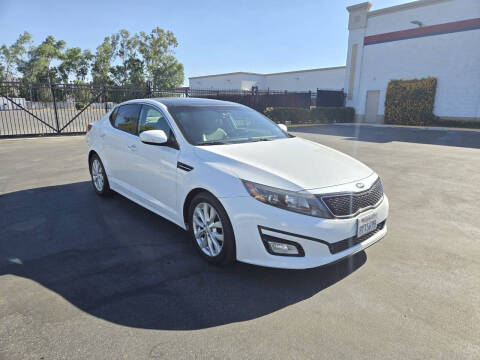 2015 Kia Optima for sale at E and M Auto Sales in Bloomington CA