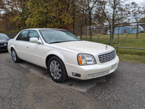 2003 Cadillac DeVille for sale at JEREMYS AUTOMOTIVE in Casco MI