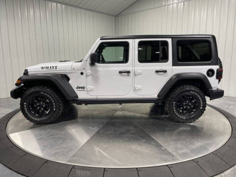2021 Jeep Wrangler Unlimited for sale at HILAND TOYOTA in Moline IL