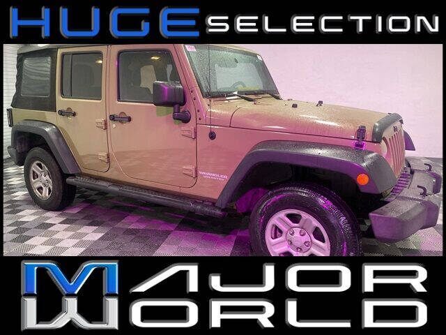 https://cdn05.carsforsale.com/009d72e517cc53e0bc0eaca031c5407f85/1280x960/2013-jeep-wrangler-unlimited-unlimited-sport.jpg