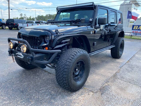 2012 Jeep Wrangler Unlimited for sale at Bay Motors in Tomball TX