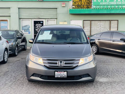 2012 Honda Odyssey for sale at STARK AUTO SALES INC in Modesto CA