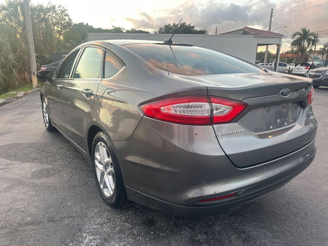 2014 Ford Fusion for sale at Tropical Auto Sales in North Palm Beach, FL