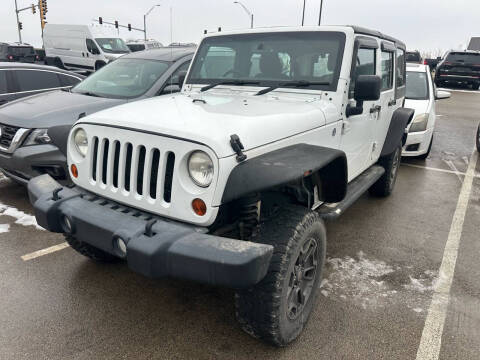 2013 Jeep Wrangler Unlimited for sale at Postal Pete in Galena IL