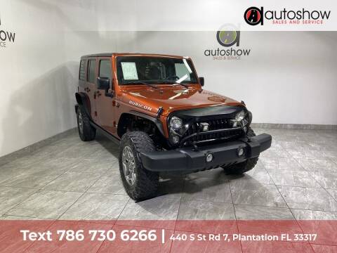 2014 Jeep Wrangler Unlimited for sale at AUTOSHOW SALES & SERVICE in Plantation FL