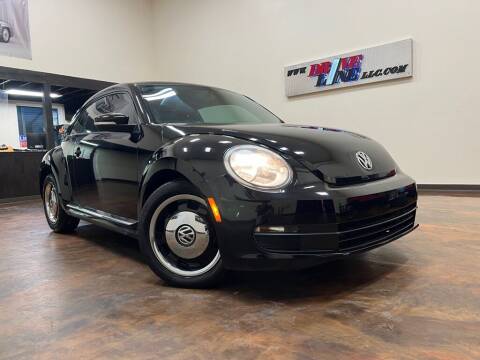 2012 Volkswagen Beetle for sale at Driveline LLC in Jacksonville FL