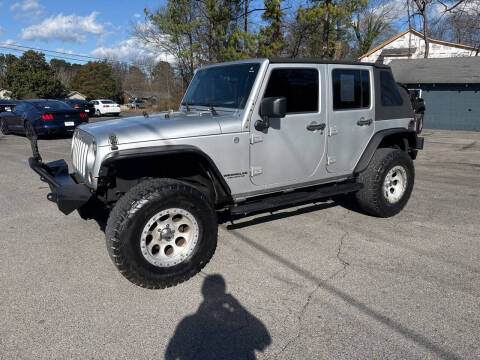 2009 Jeep Wrangler Unlimited for sale at Adairsville Auto Mart in Plainville GA