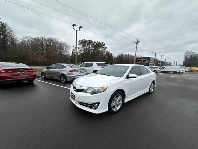 2014 Toyota Camry for sale at Auto Hunter in Webster, WI