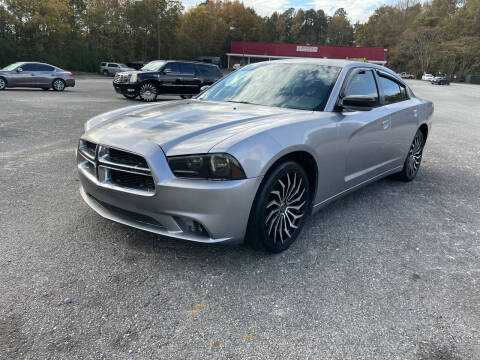 2014 Dodge Charger for sale at Certified Motors LLC in Mableton GA