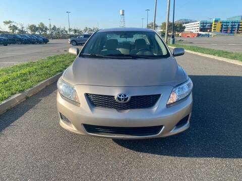 2009 Toyota Corolla for sale at D Majestic Auto Group Inc in Ozone Park NY