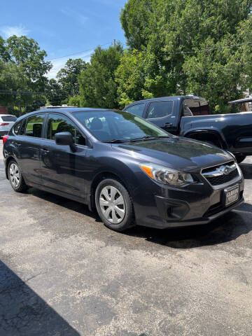 2014 Subaru Impreza for sale at GARROW AUTO SALES in Pittsford VT