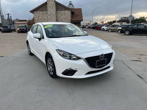 2015 Mazda MAZDA3 for sale at A & B Auto Sales LLC in Lincoln NE
