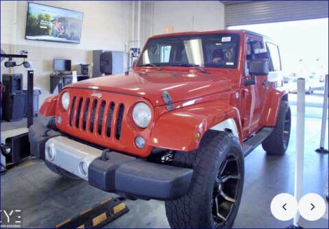 2014 Jeep Wrangler for sale at CHRIS SPEARS' PRESTIGE AUTO SALES INC in Ocala FL