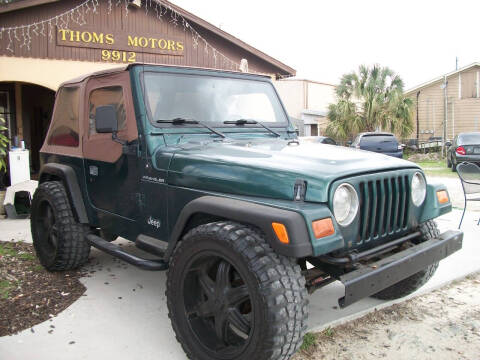 1999 Jeep Wrangler for sale at THOM'S MOTORS in Houston TX