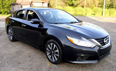 2017 Nissan Altima for sale at Angelo's Auto Sales in Lowellville OH