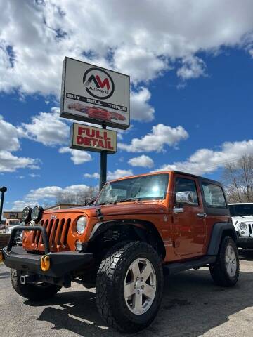 2011 Jeep Wrangler for sale at Automania in Dearborn Heights MI