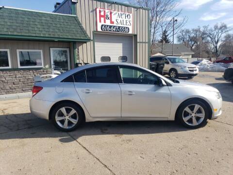 2013 Chevrolet Cruze for sale at H & L AUTO SALES LLC in Wyoming MI