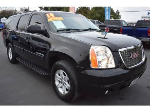 2014 GMC Yukon XL for sale at MERCED AUTO WORLD in Merced CA