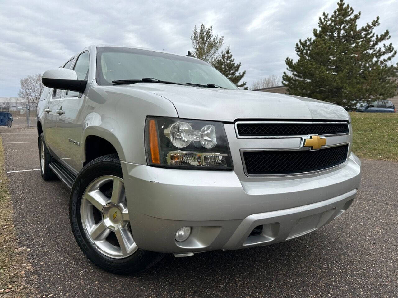 2011 Chevrolet Suburban for sale at JUST AUTOS in MINNEAPOLIS, MN