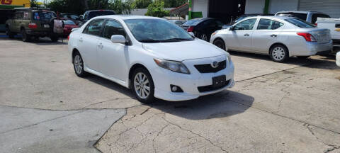 2009 Toyota Corolla for sale at AUTO TOURING in Orlando FL