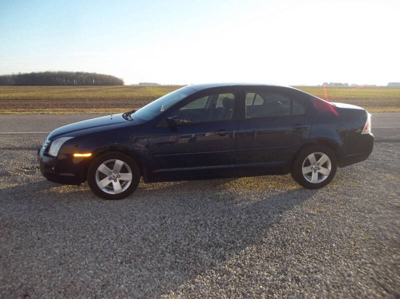 2006 Ford Fusion for sale at Howe's Auto Sales in Grelton OH