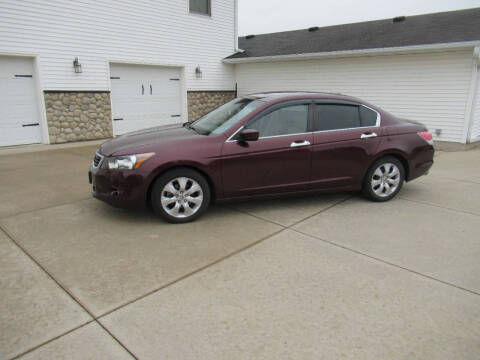 2010 Honda Accord for sale at OLSON AUTO EXCHANGE LLC in Stoughton WI