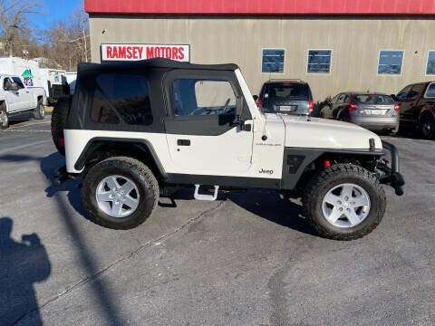 1997 Jeep Wrangler for sale at Ramsey Motors in Riverside MO