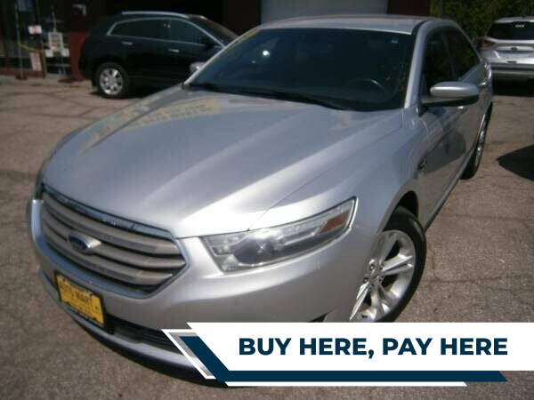 2014 Ford Taurus for sale at WESTSIDE AUTOMART INC in Cleveland OH