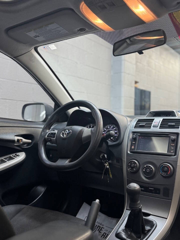 2013 Toyota Corolla for sale at Advanced Premier Auto in Hillsboro, OR