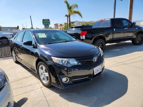 2013 Toyota Camry for sale at E and M Auto Sales in Bloomington CA