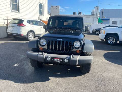 2013 Jeep Wrangler Unlimited for sale at A1 Auto Mall LLC in Hasbrouck Heights NJ