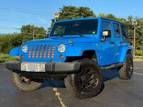2011 Jeep Wrangler Unlimited for sale at MAGIC AUTO SALES in Little Ferry NJ