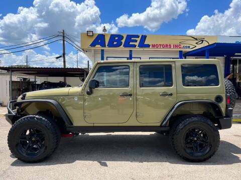 2013 Jeep Wrangler Unlimited for sale at Abel Motors, Inc. in Conroe TX