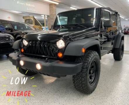 2012 Jeep Wrangler Unlimited for sale at Dixie Motors in Fairfield OH