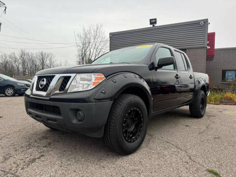 2013 Nissan Frontier for sale at George's Used Cars in Brownstown MI