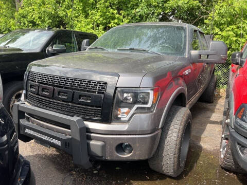 2012 Ford F-150 for sale at Chinos Auto Sales in Crystal MN
