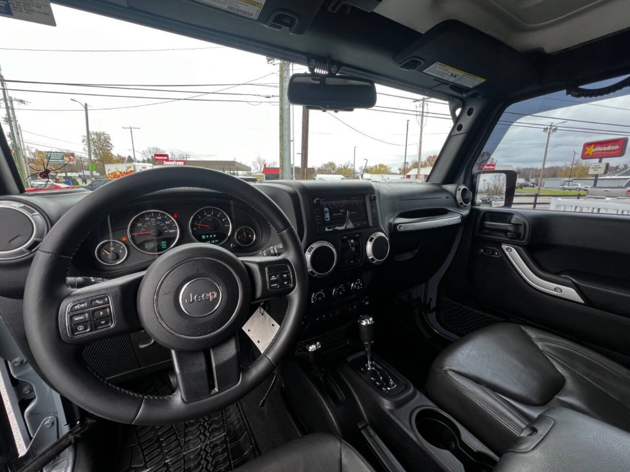 2015 Jeep Wrangler Unlimited for sale at Billy's Auto Discount Center in Evansville, IN