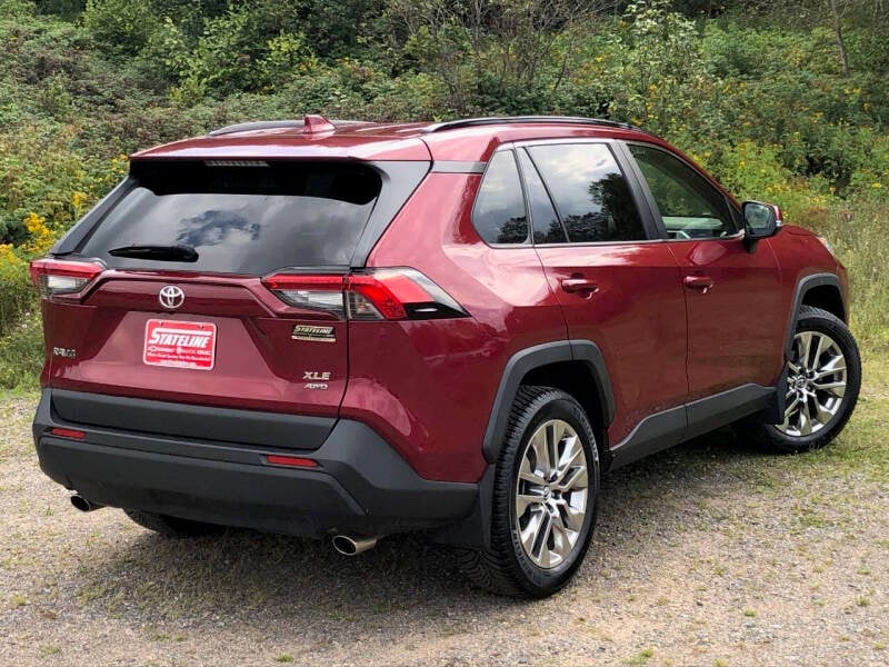 Used 2019 Toyota RAV4 XLE Premium with VIN JTMA1RFV9KD514370 for sale in Iron River, MI