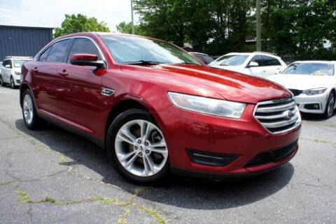 2013 Ford Taurus for sale at CU Carfinders in Norcross GA