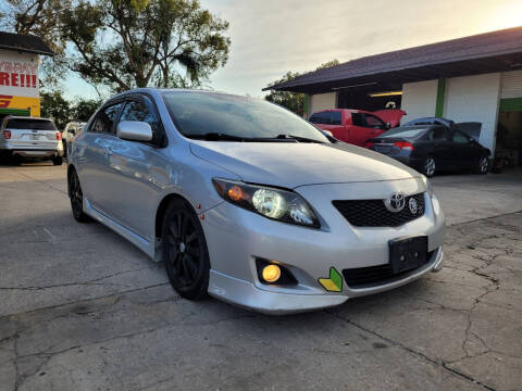 2009 Toyota Corolla for sale at AUTO TOURING in Orlando FL