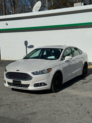 2016 Ford Fusion for sale at GTI Auto Exchange in Durham NC