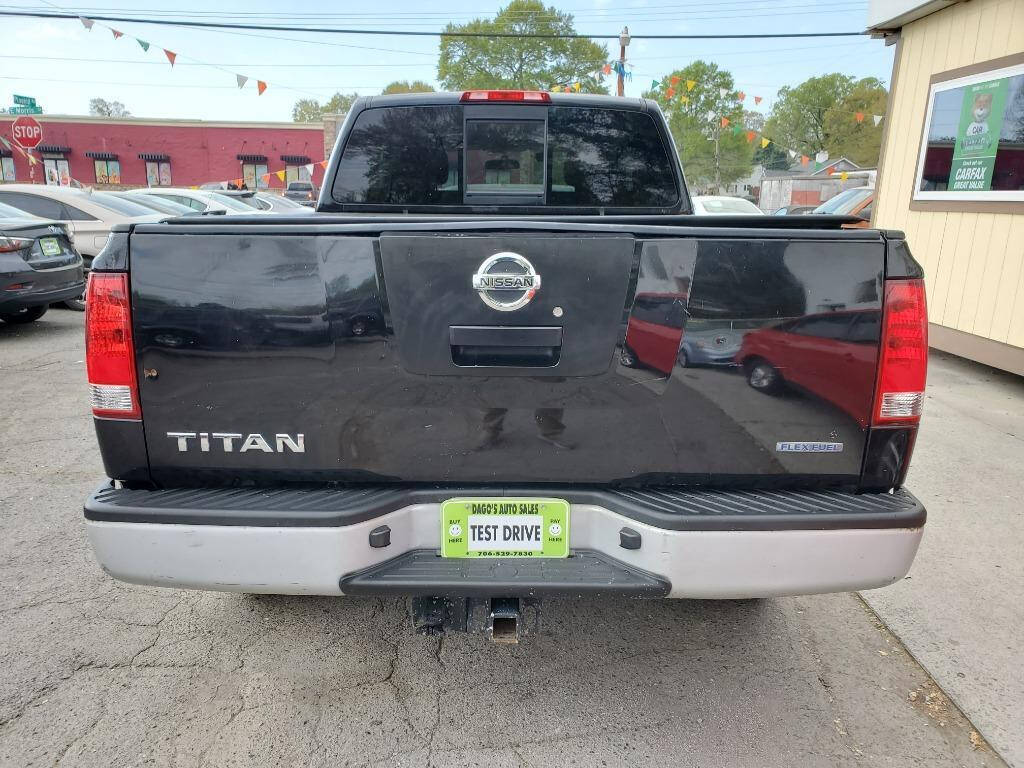 2011 Nissan Titan for sale at DAGO'S AUTO SALES LLC in Dalton, GA