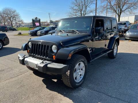 2012 Jeep Wrangler Unlimited for sale at Dean's Auto Sales in Flint MI