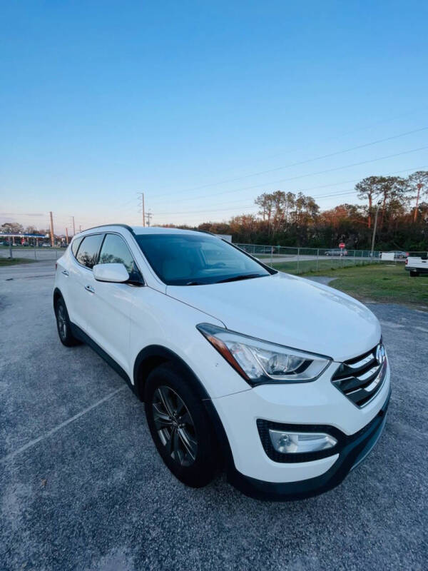 2014 Hyundai Santa Fe Sport for sale at CARNUGO in Lakeland FL