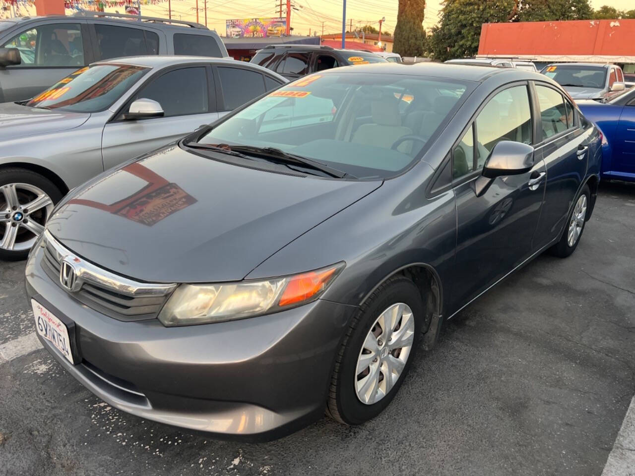 2012 Honda Civic for sale at Unique Auto Sales, Inc. in Bell, CA